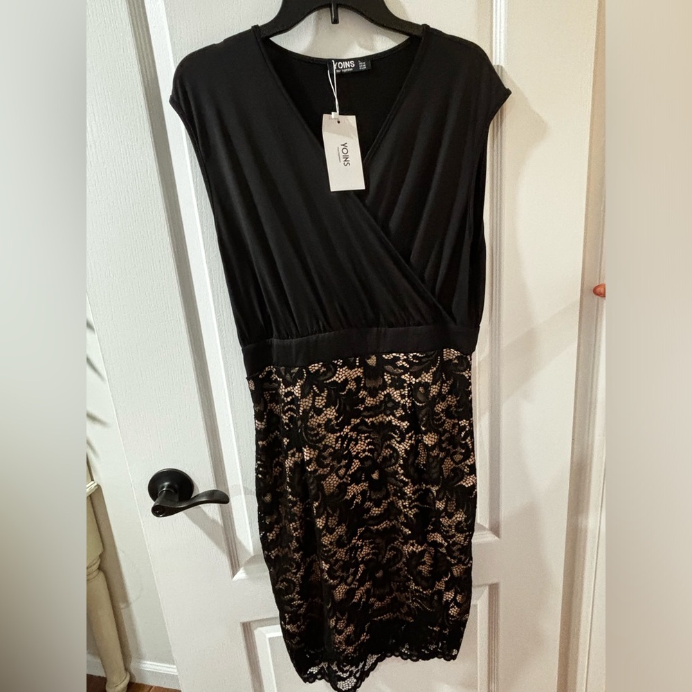 Formal Black dress with lace on bottom part.